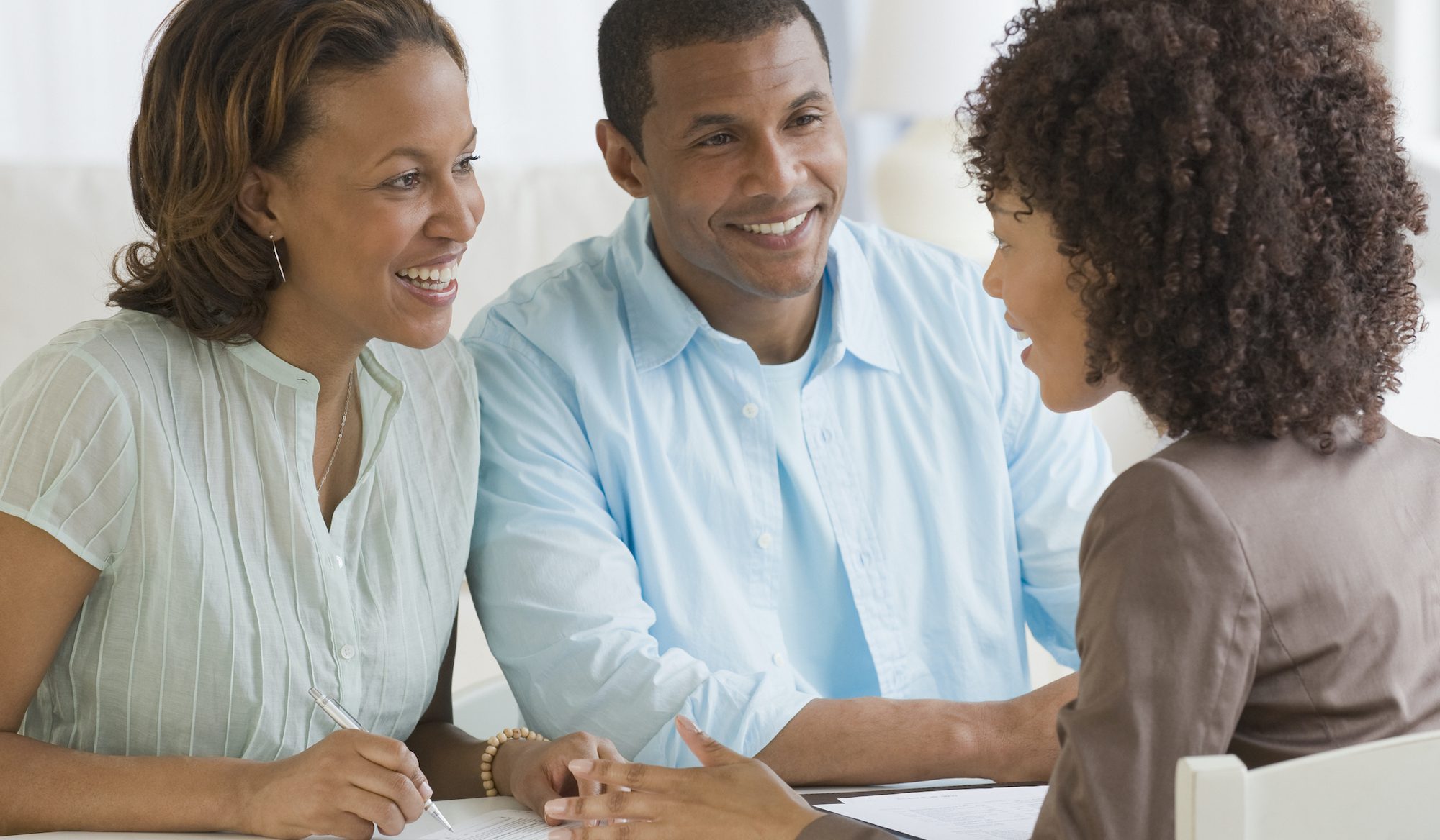 African couple receiving financial consultation