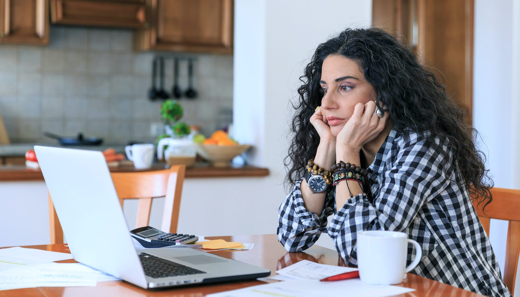 Woman having problems with home bills